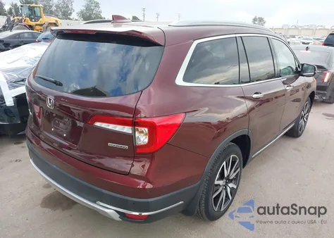 2021 Honda Pilot 2Wd Touring 8 Passenger z USA, uszkodzony, nr VIN 5FNYF5H96MB017622